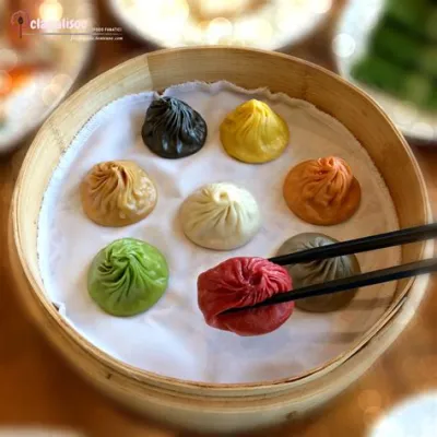  Xiao Long Bao: Uma Sinfonia de Sabores Explosivos em cada Mordida e uma Textura Irresistível que Derrete na Boca!